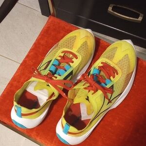 Adidas Yellow and Red Athletic Shoes with Modern Design